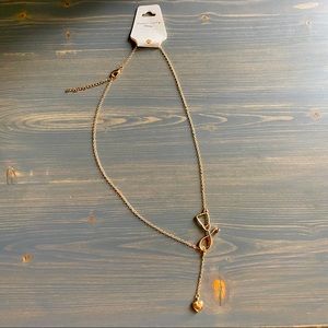 Gold stethoscope heart charm necklace